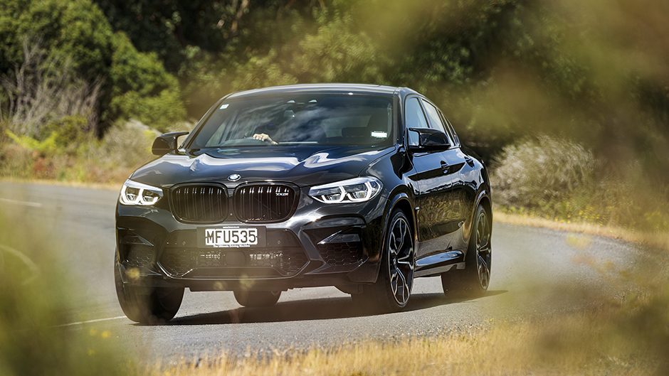 2019 BMW X4 M Competition driving through corner