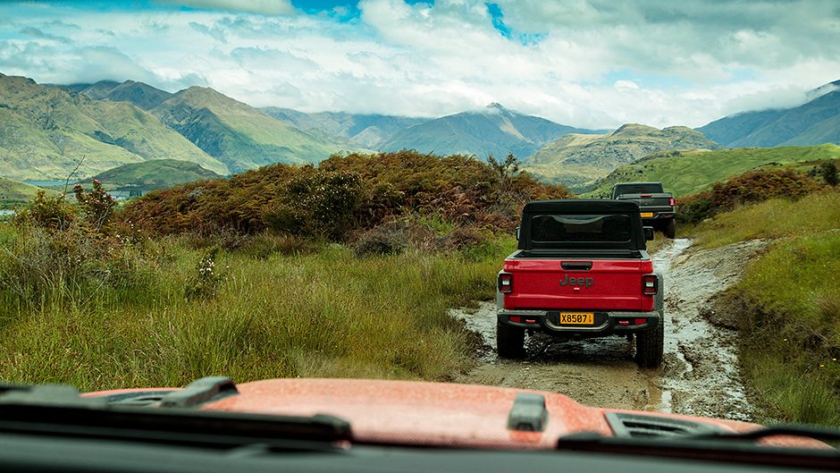 2020 Jeep Gladiator driving on muddy tracks