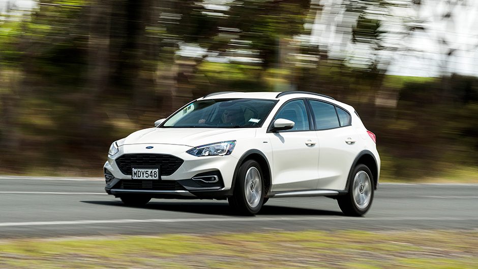 2019 Ford Focus Active driving past trees