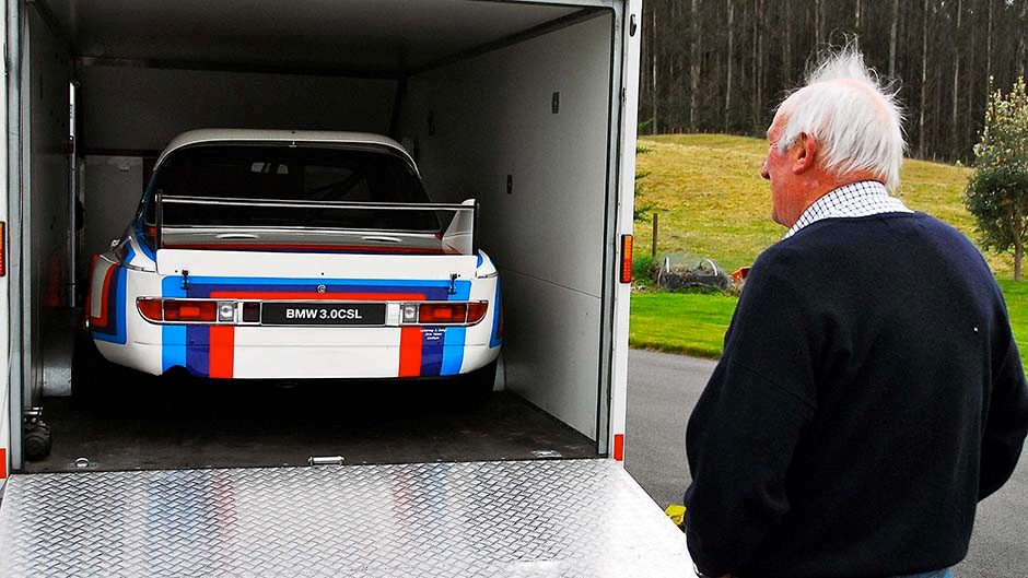 Chris Amon watching BMW 3.0CSL being unloaded from trailer