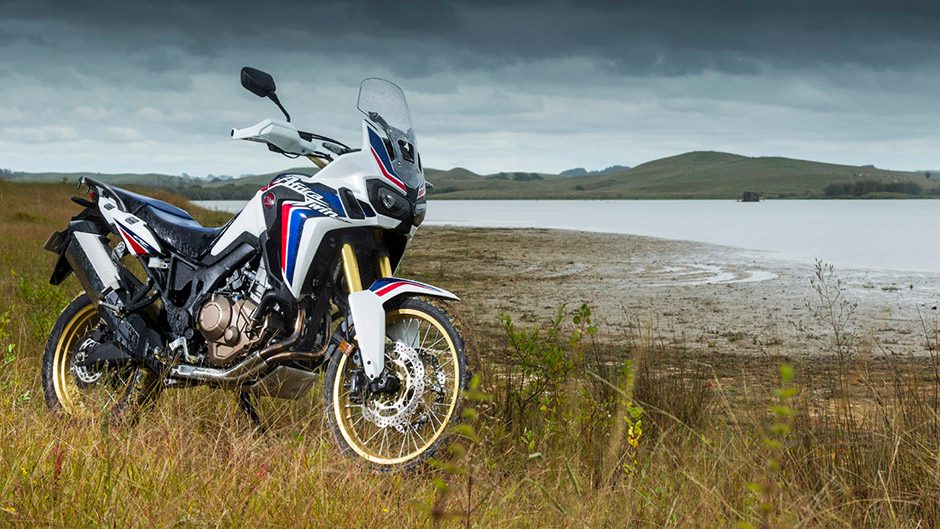 Honda Africa Twin parked in front of lake