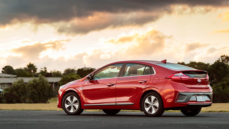 2017 Hyundai Ioniq Electric with sun setting in background