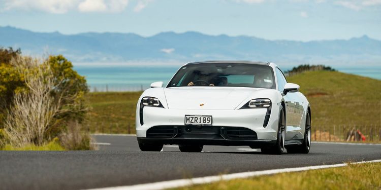 Porsche Taycan driving front view