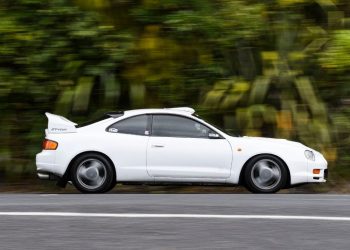 Toyota Celica GT-Four driving past trees