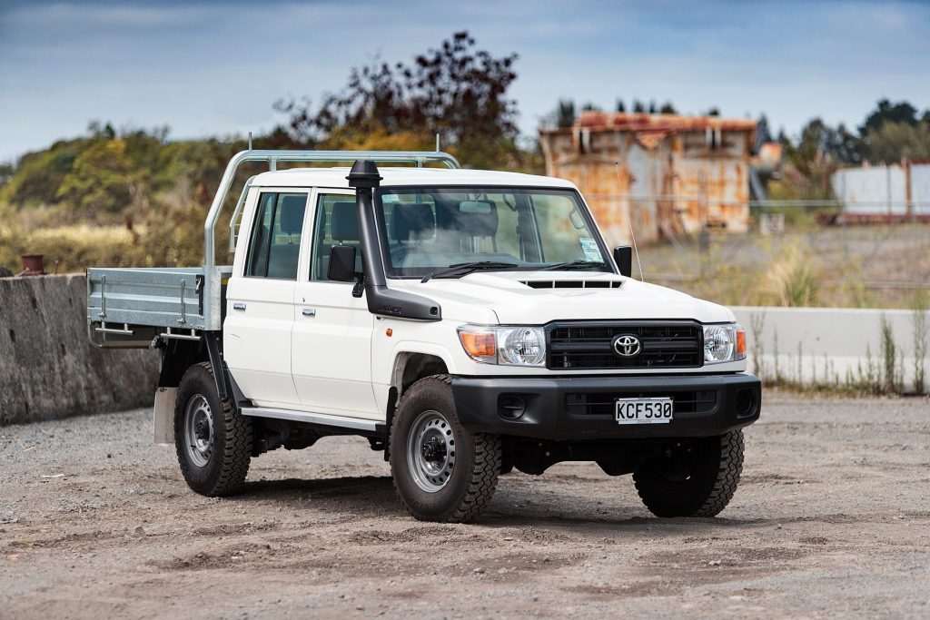 Toyota Land Cruiser 70 Series ute parked on gravel