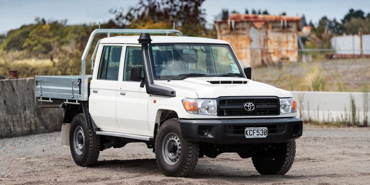 Toyota Land Cruiser 70 Series ute parked on gravel