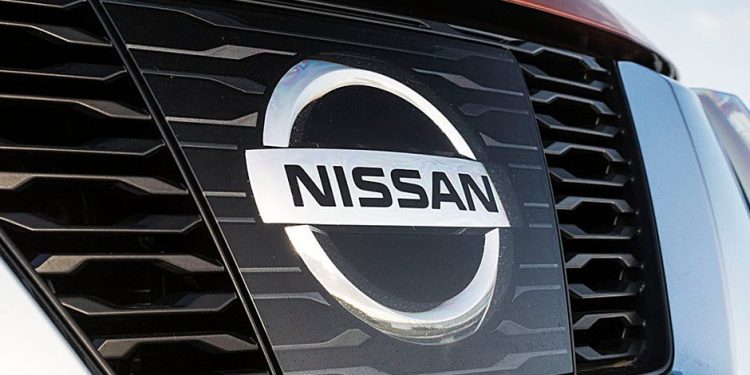 Nissan logo on grille close up view