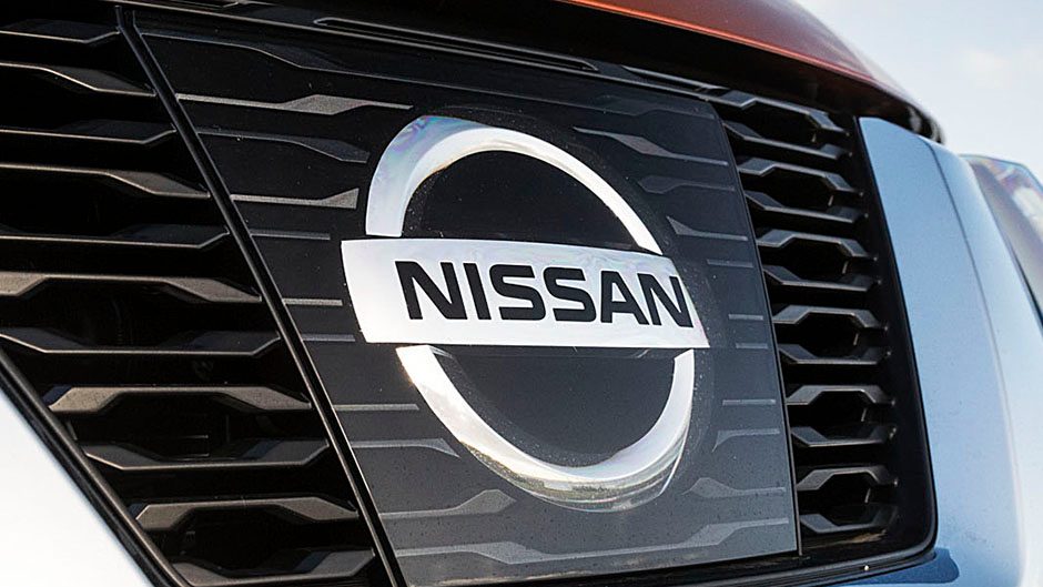 Nissan logo on grille close up view