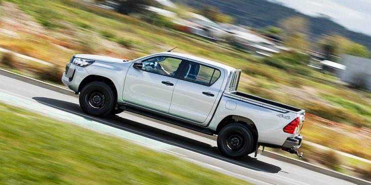 Toyota Hilux driving on road