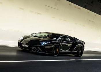 Lamborghini Aventador S front three quarter view driving through tunnel