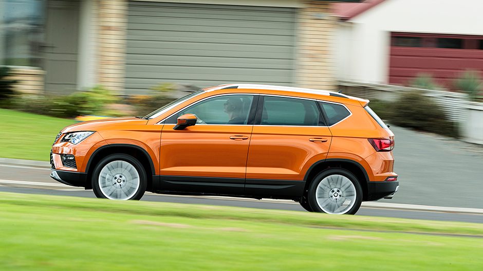 2018 Seat Ateca Xcellence driving past house