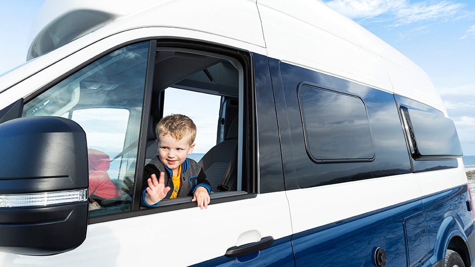 2020 Volkswagen Grand California 600 little boy waving out of window