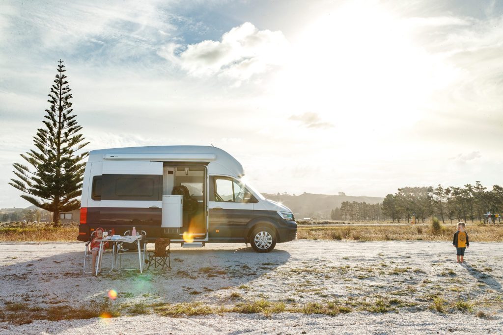 2020 Volkswagen Grand California 600 with sun setting behind