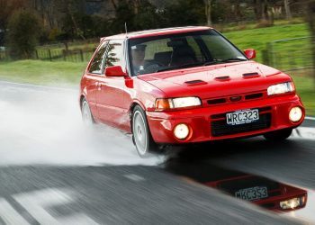 Mazda Familia GT-R on wet road