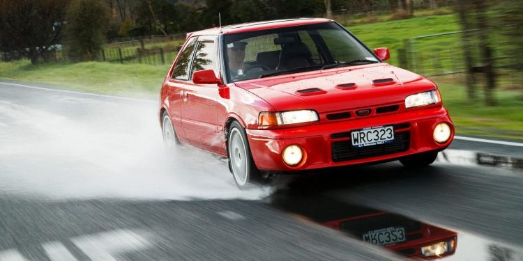 Mazda Familia GT-R on wet road