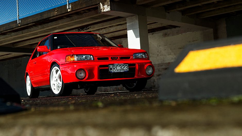 1992 Mazda Familia GT-R in front of wall