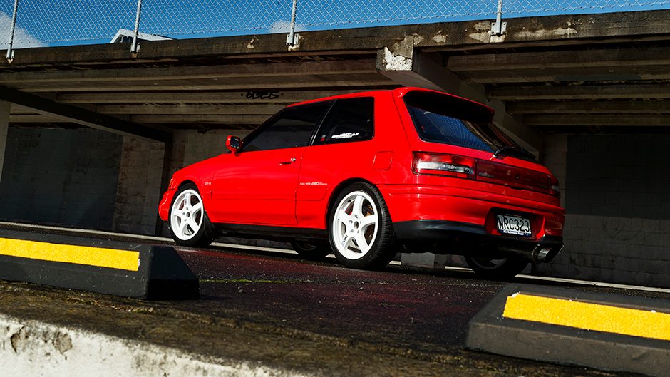 1992 Mazda Familia GT-R rear static in front of wall