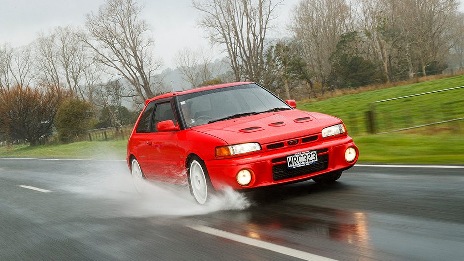 1992 Mazda Familia GT-R driving through water