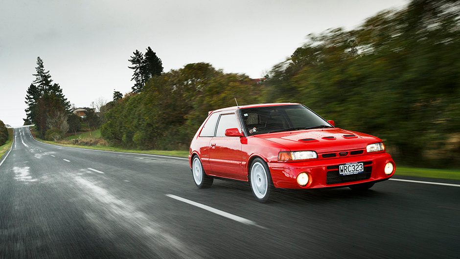1992 Mazda Familia GT-R driving on straight road