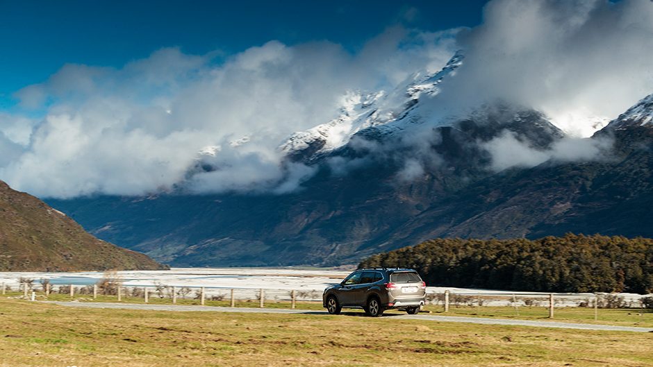 2018 Subaru Forester Premium driving past mountains