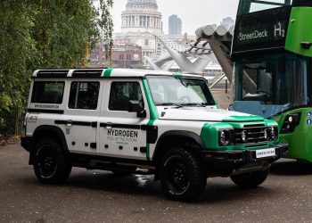 Ineos Grenadier FCEV parked in front of bus