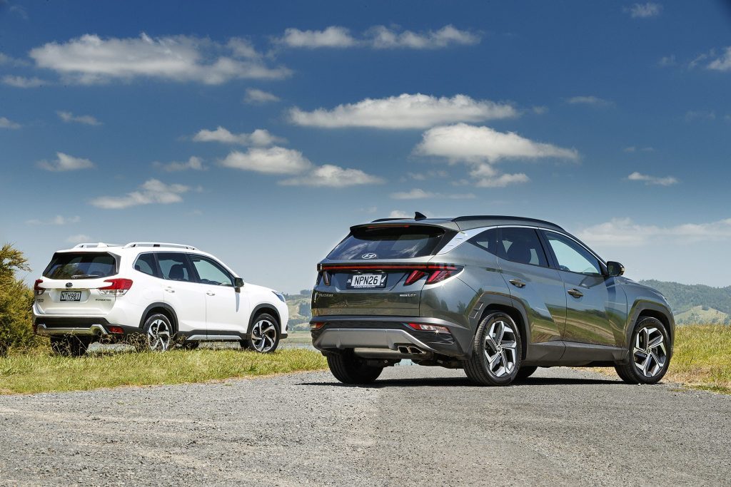 Subaru Forester Premium vs Hyundai Tucson sat on top of hill