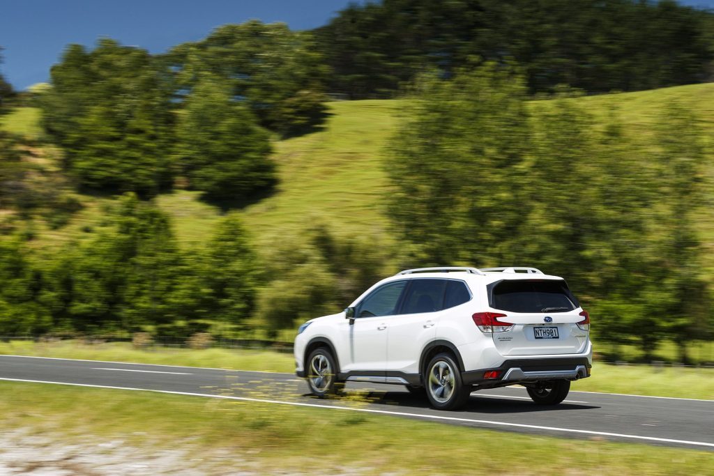 Subaru Forester Premium vs Hyundai Tucson driving through countryside
