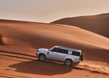 Land Rover Defender 130 on sand dune