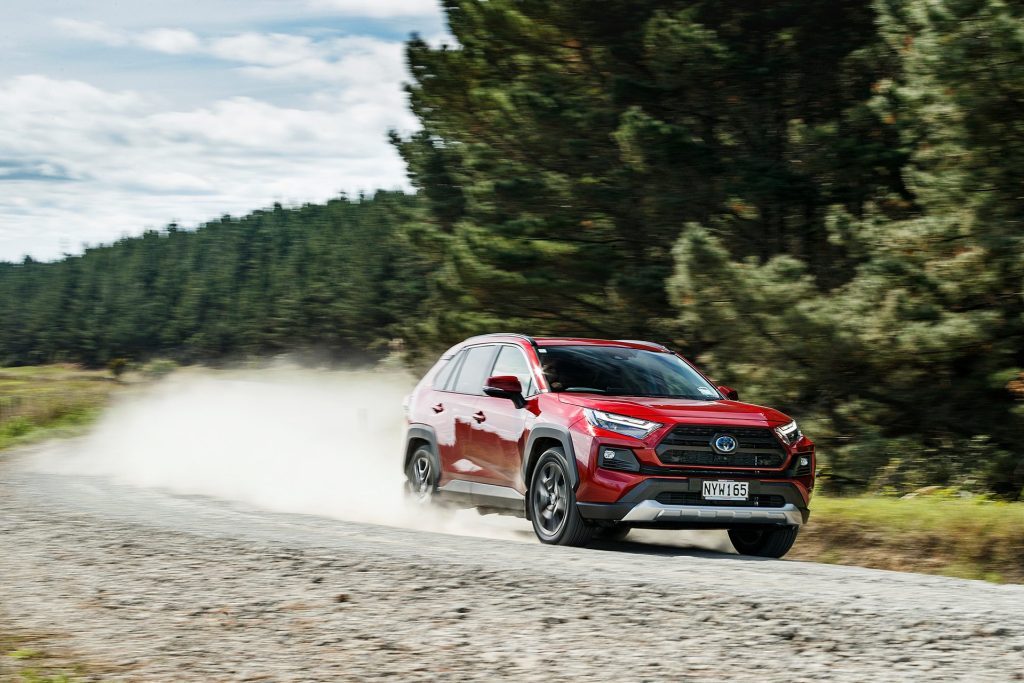 Toyota RAV4 front three quarters driving along gravel road