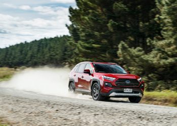 Toyota RAV4 front three quarters driving along gravel road