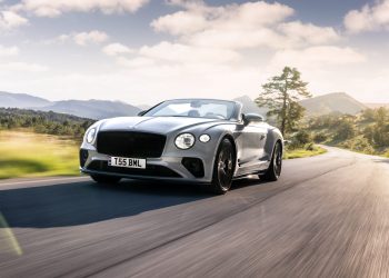 Bentley Continental convertible driving along road