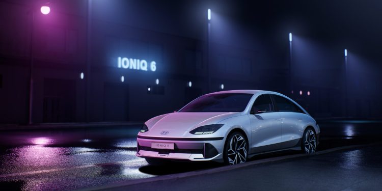 Hyundai Ioniq 6 at night time surrounded by ambient lighting