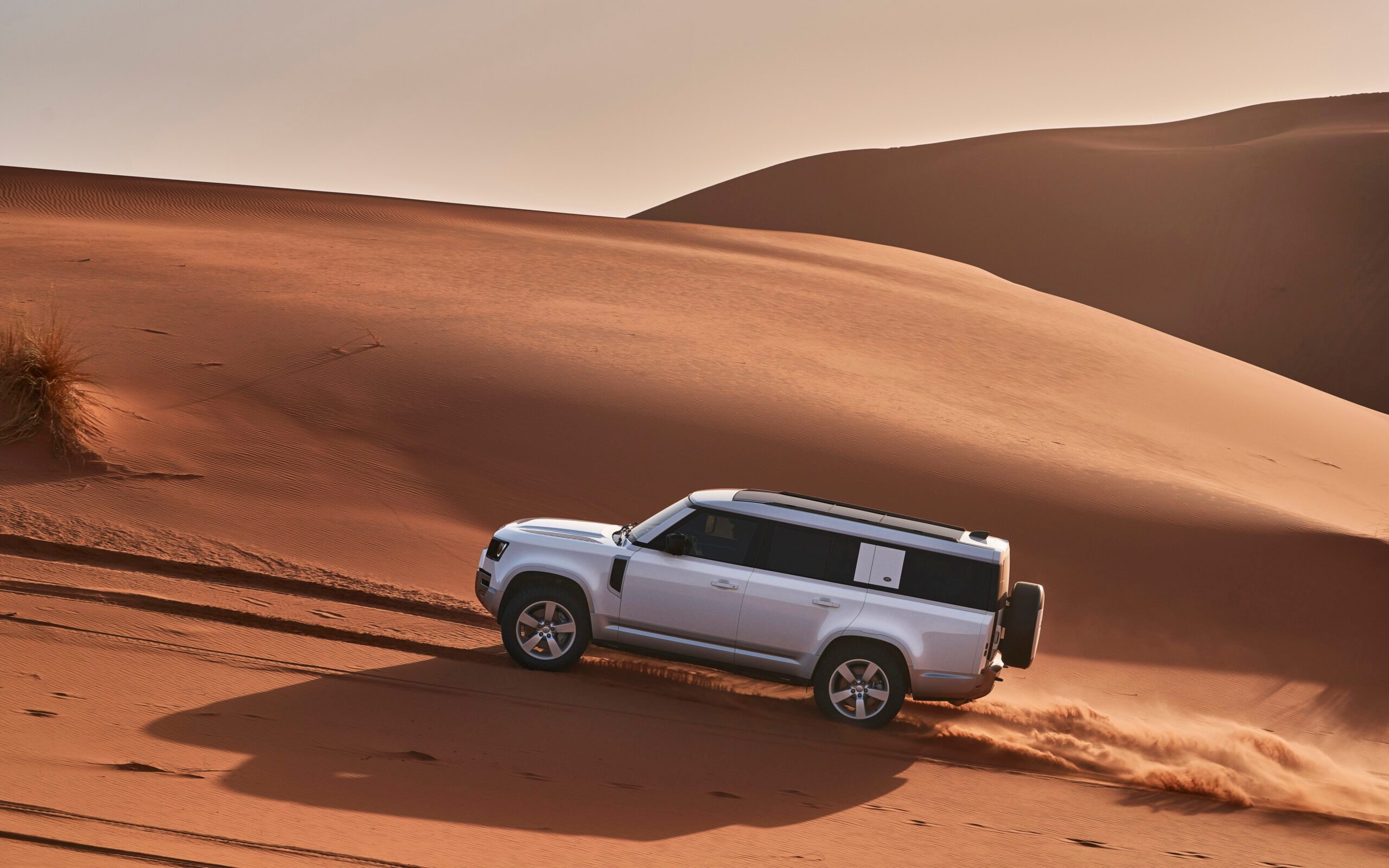 Land Rover Defender 130 on sand dune