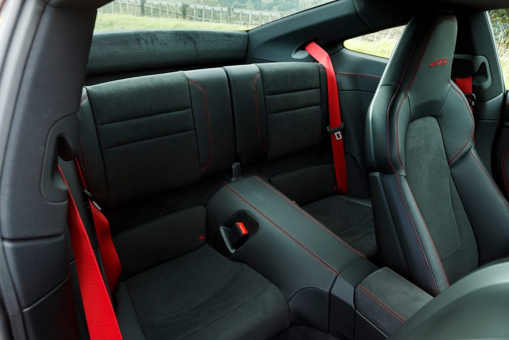 red Porsche 911 GTS back seat