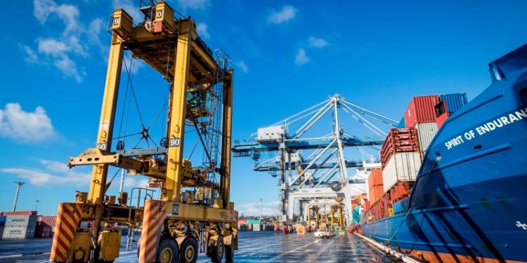 Crane at port with ship