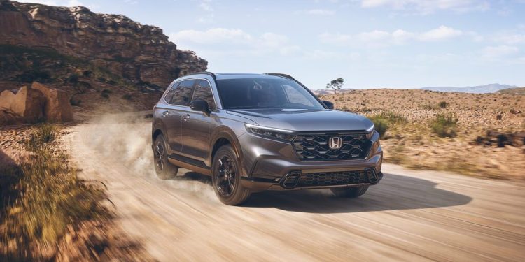 Honda CR-V sixth generation front three quarters driving in desert