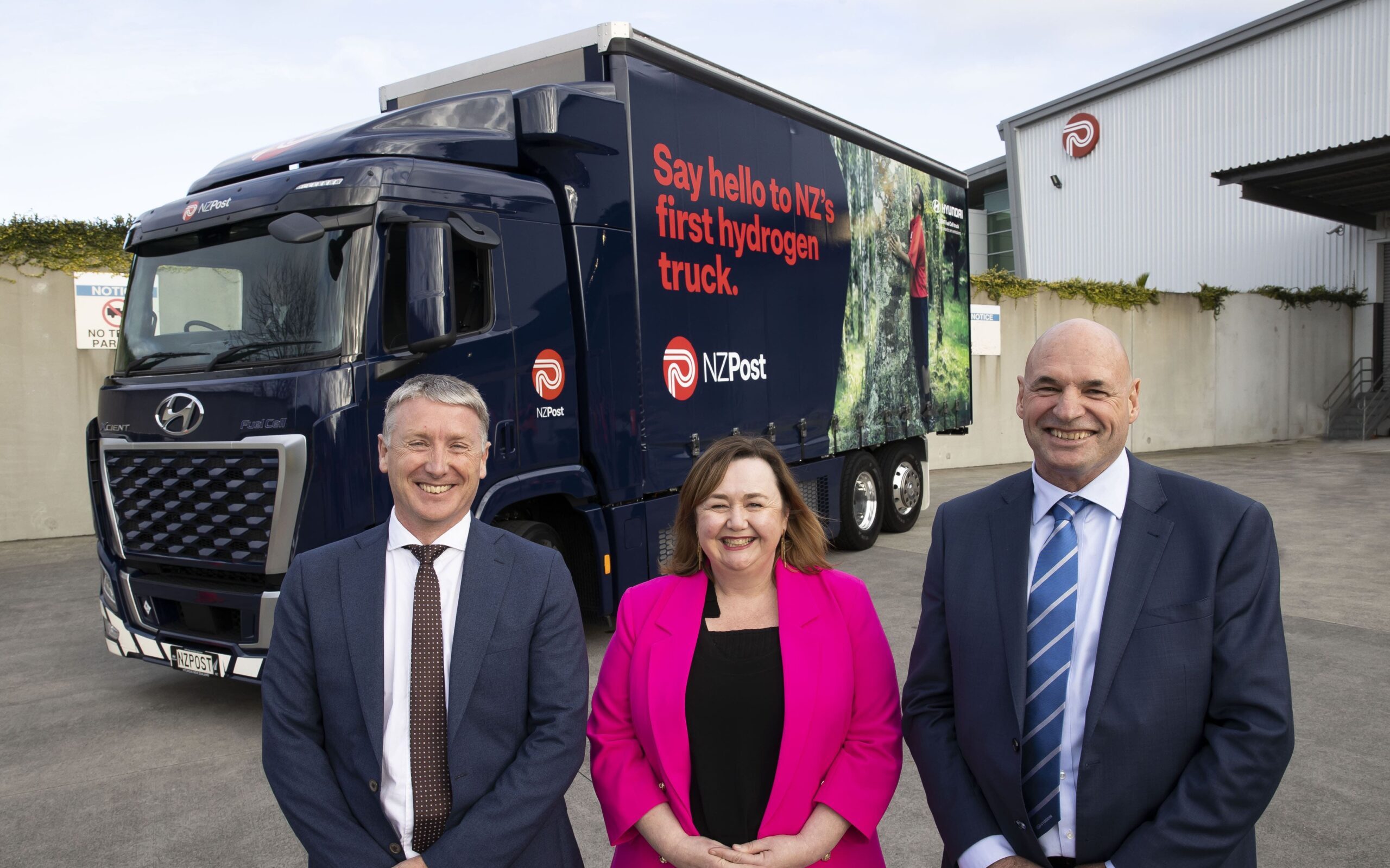 Dave Walsh, Minister Megan Woods, Andy Sinclair unveil New Zealand Post Hyundai Xcient hydrogen-powered truck