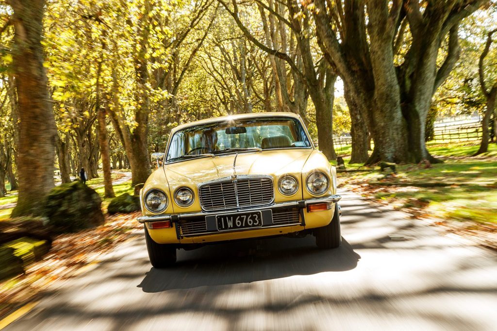 1978 Jaguar XJ6 4.2 LWB driving through trees