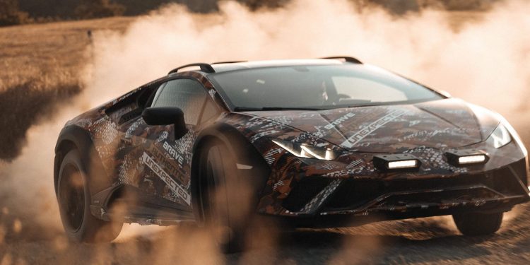 Lamborghini Huracan Sterrato all-terrain supercar drifting off road front three quarters