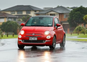 Fiat 500 Dolcevita driving through suburbia