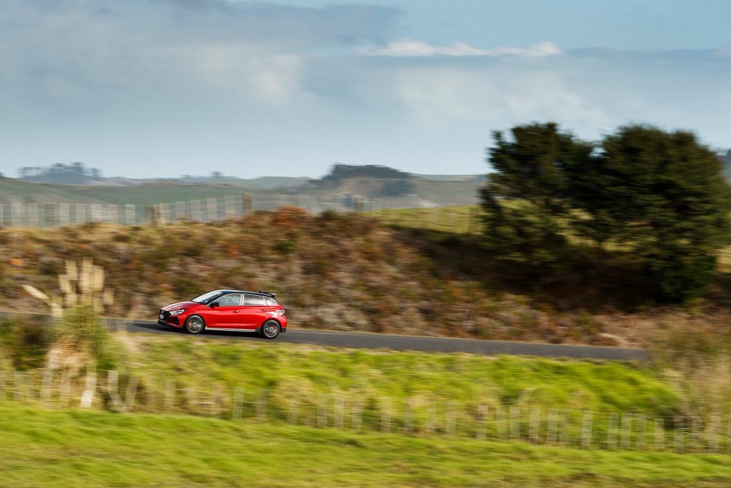 Hyundai i20 N driving through countryside