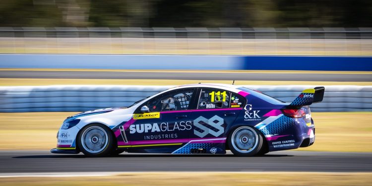 Holden Commodore V8 Supercar side racing on track