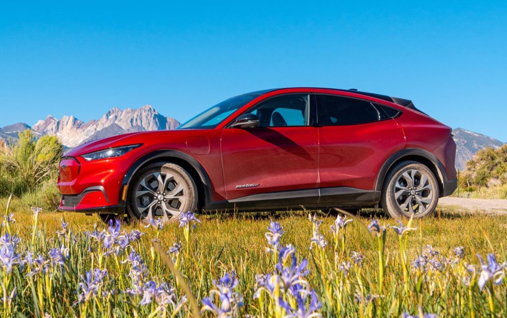 Ford Mustang Mach-E side next to mountains