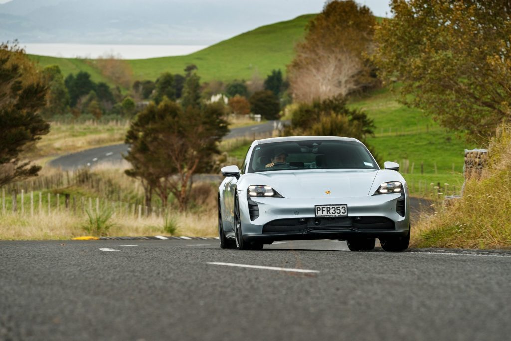 2022 Porsche Taycan GTS driving on windy road