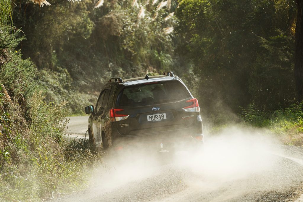 Subaru Forester X-Sport driving on dusty road