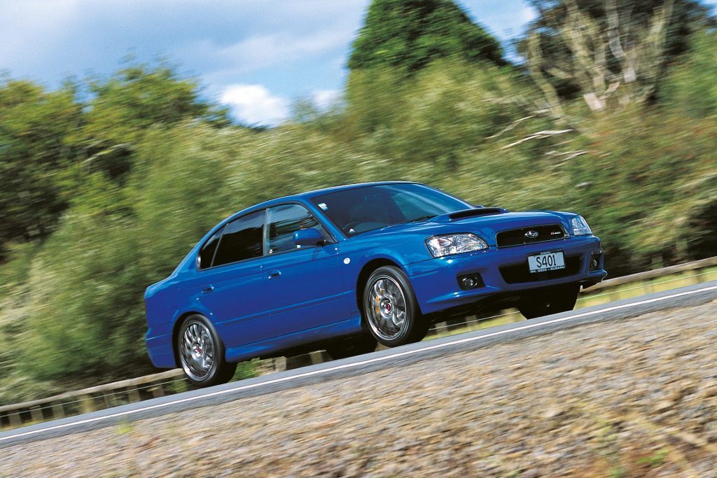 2003 Subaru Legacy S401 STi driving on country road