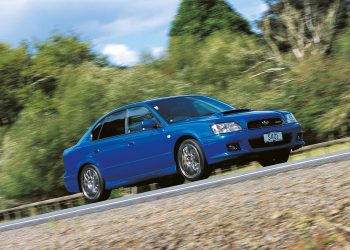 2003 Subaru Legacy S401 STi driving on country road