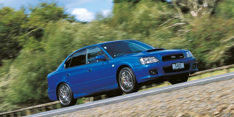 2003 Subaru Legacy S401 STi driving on country road