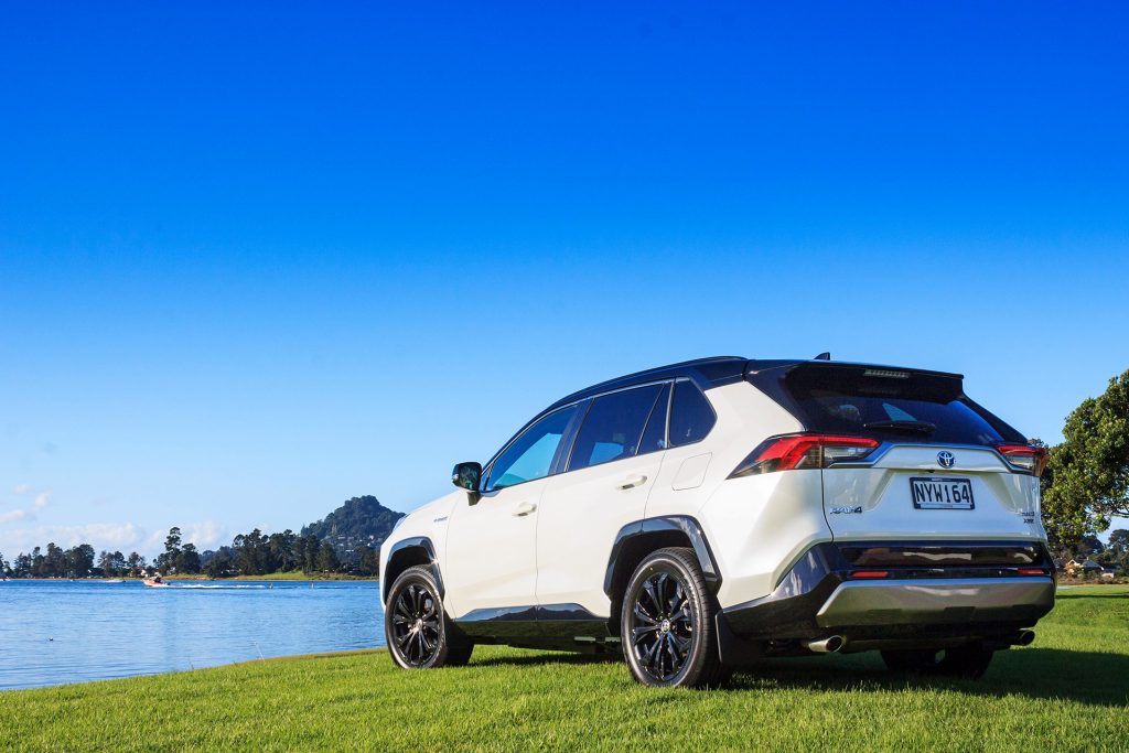 2022 Toyota RAV4 XSE Hybrid parked by lakeside