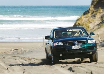 2003 Volkswagen Touareg driving over sand dunes